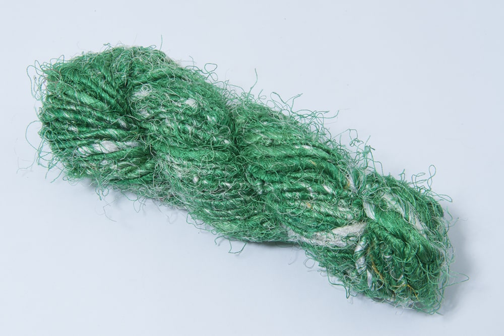 Green recycled sari silk yarn